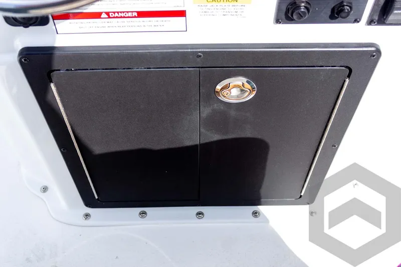 Slide: The Image of Control panel of 2026 G3 Bay 22 GX boat with warning labels. - 50