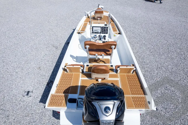 Slide: The Image of 2026 G3 Bay 22 GX boat with Yamaha engine, featuring sleek design and modern controls. - 65