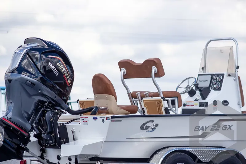 Slide: The Image of 2026 G3 Bay 22 GX boat with Yamaha engine and Garmin navigation system. - 9