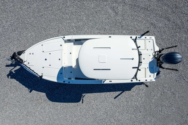 Slide: The Image of Overhead view of 2026 Pathfinder 2500 Hybrid boat on gravel surface. - 101