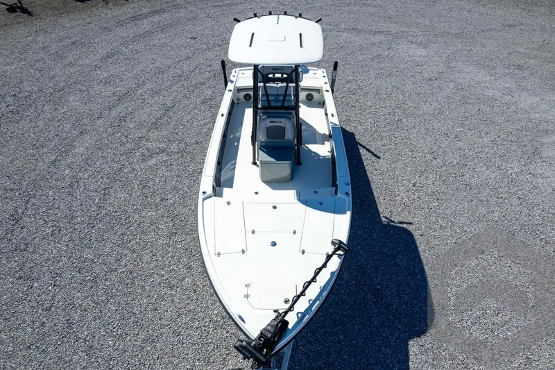 Slide: The Image of 2026 Pathfinder 2500 Hybrid boat on gravel surface, aerial view. - 106
