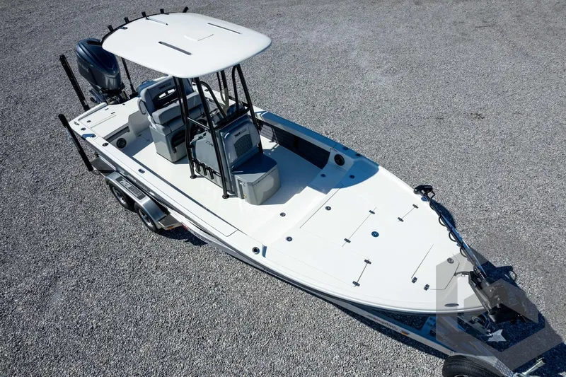 Slide: The Image of 2026 Pathfinder 2500 Hybrid boat on trailer, featuring sleek design and modern amenities. - 107