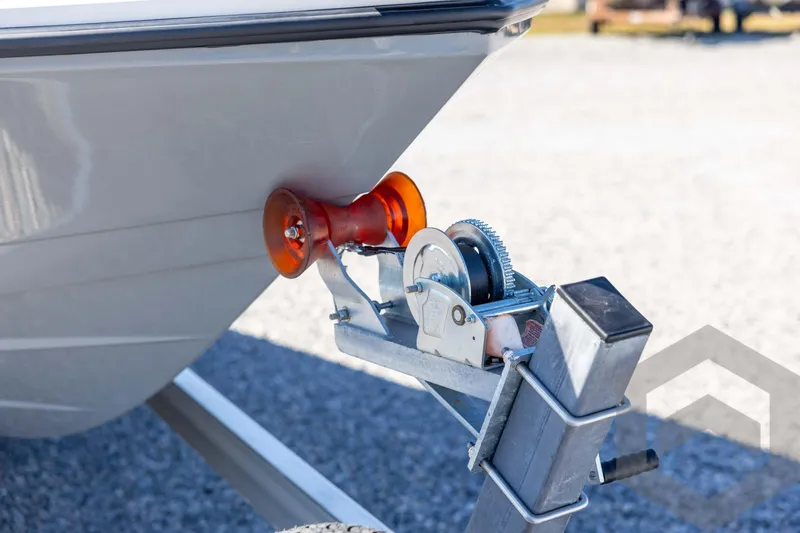 Slide: The Image of Trailer hitch and winch system on 2026 Pathfinder 2500 Hybrid boat. - 11