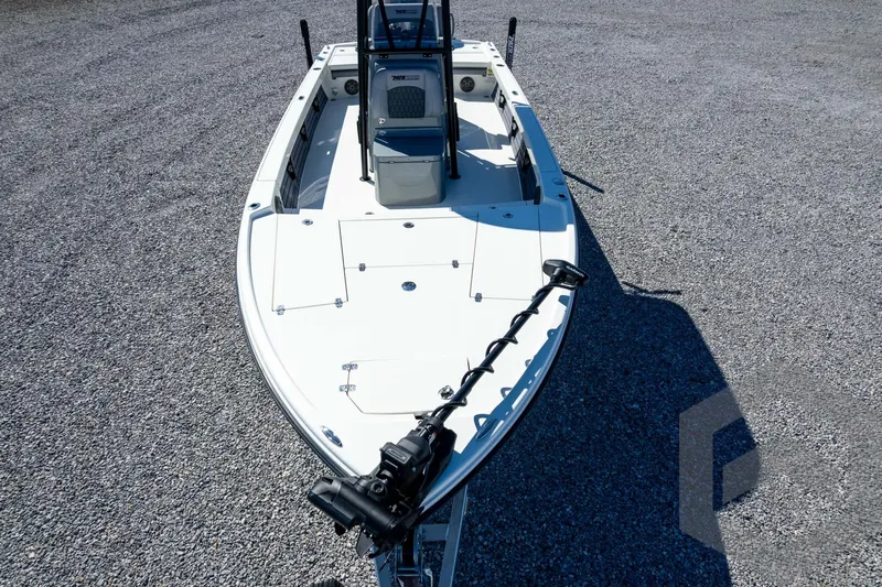 Slide: The Image of 2026 Pathfinder 2500 Hybrid boat on gravel, showcasing sleek design and modern features. - 111