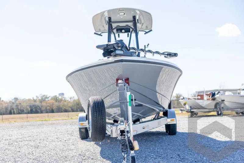 Slide: The Image of 2026 Pathfinder 2500 Hybrid boat on trailer, outdoor display. - 2