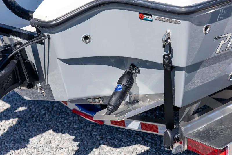 Slide: The Image of Rear view of 2026 Pathfinder 2500 Hybrid boat on trailer, showcasing trim tab and power pole. - 20