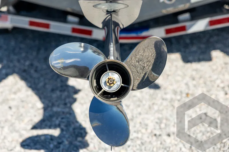 Slide: The Image of Close-up of a shiny boat propeller on a 2026 Pathfinder 2500 Hybrid. - 22