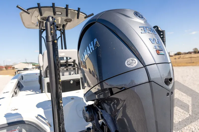 Slide: The Image of 2026 Pathfinder 2500 Hybrid boat with Yamaha 350 V6 engine, outdoor setting. - 24