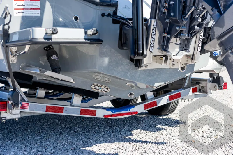 Slide: The Image of 2026 Pathfinder 2500 Hybrid boat on trailer, showcasing hull and engine details. - 26