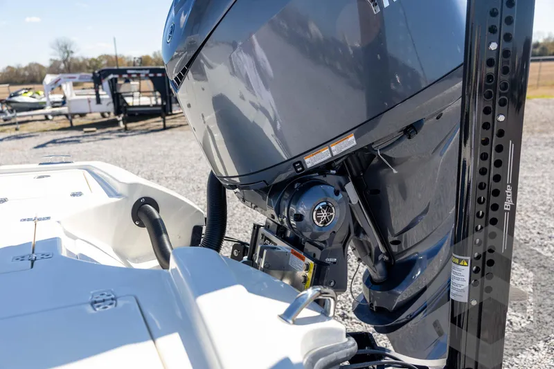 Slide: The Image of 2026 Pathfinder 2500 Hybrid boat engine close-up in outdoor setting. - 32