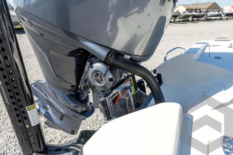 Slide: The Image of 2026 Pathfinder 2500 Hybrid boat engine detail in a sunny outdoor setting. - 33