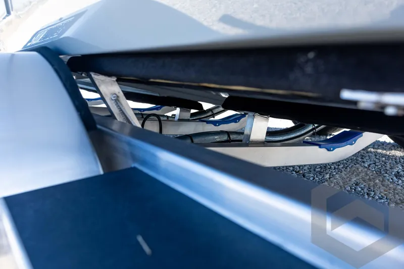 Slide: The Image of 2026 Pathfinder 2500 Hybrid boat trailer detail, showcasing undercarriage and structural components. - 36