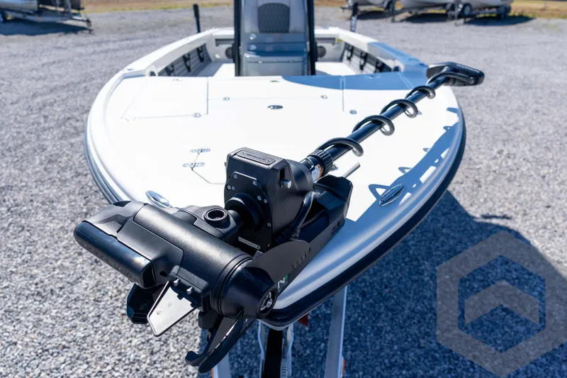 Slide: The Image of 2026 Pathfinder 2500 Hybrid boat with advanced trolling motor on gravel surface. - 41