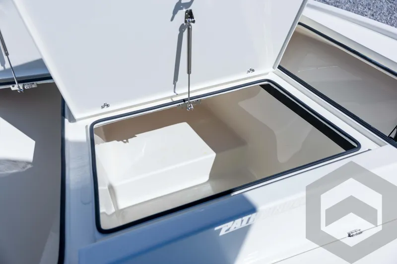 Slide: The Image of Open storage compartment on 2026 Pathfinder 2500 Hybrid boat. - 51