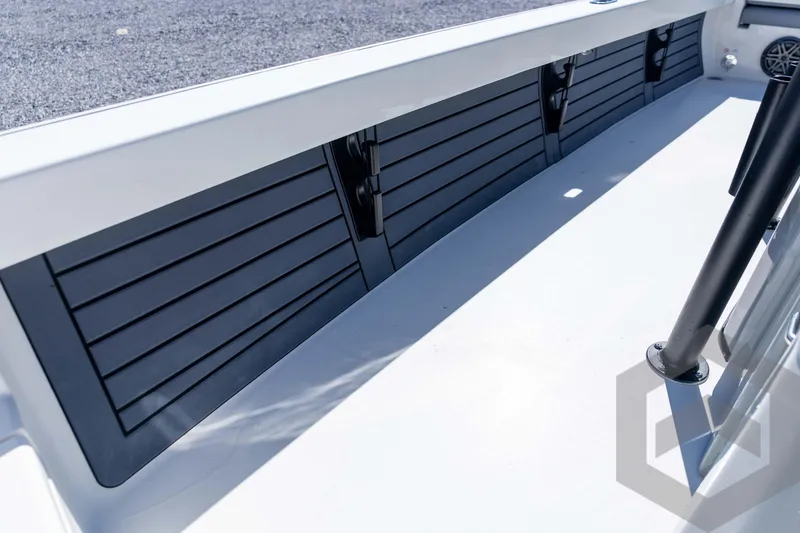 Slide: The Image of 2026 Pathfinder 2500 Hybrid boat interior with sleek black paneling and modern design elements. - 63