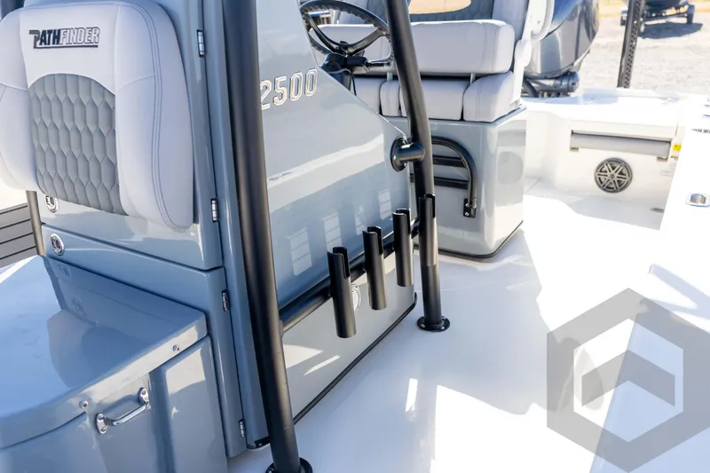 Slide: The Image of 2026 Pathfinder 2500 Hybrid boat interior with seating and rod holders. - 65