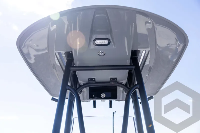 Slide: The Image of 2026 Pathfinder 2500 Hybrid boat T-top with sleek design and integrated lighting. - 66