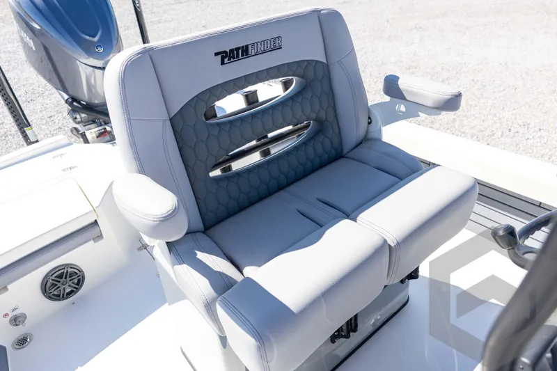 Slide: The Image of 2026 Pathfinder 2500 Hybrid boat seat with armrests and stylish design. - 79