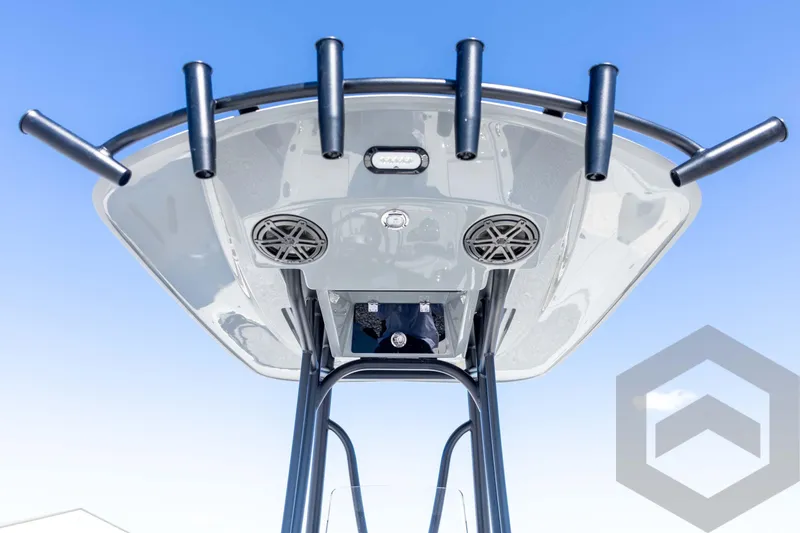 Slide: The Image of T-top view of 2026 Pathfinder 2500 Hybrid boat with rod holders and speakers. - 81