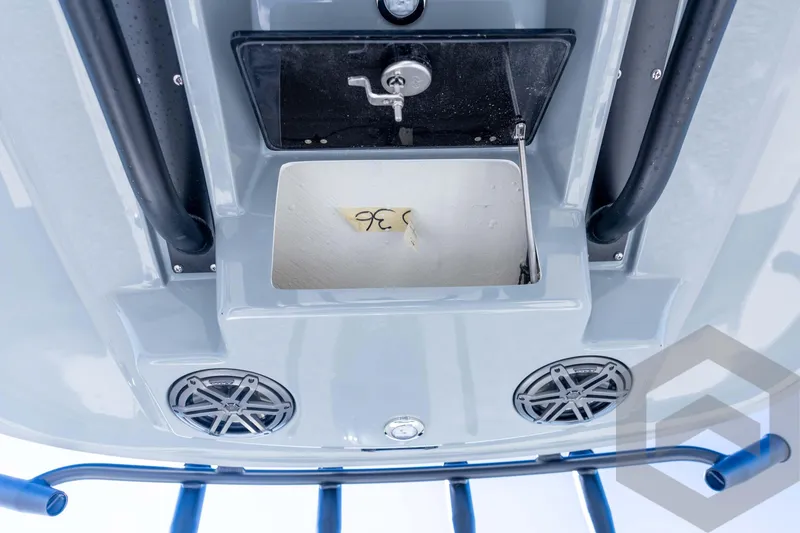 Slide: The Image of 2026 Pathfinder 2500 Hybrid boat interior with speakers and storage compartment. - 83