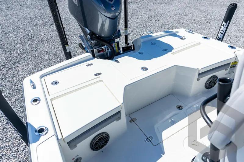 Slide: The Image of 2026 Pathfinder 2500 Hybrid boat deck with motor and storage compartments. - 84