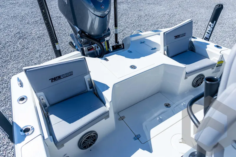 Slide: The Image of 2026 Pathfinder 2500 Hybrid boat interior with seating and motor, showcasing modern design. - 86
