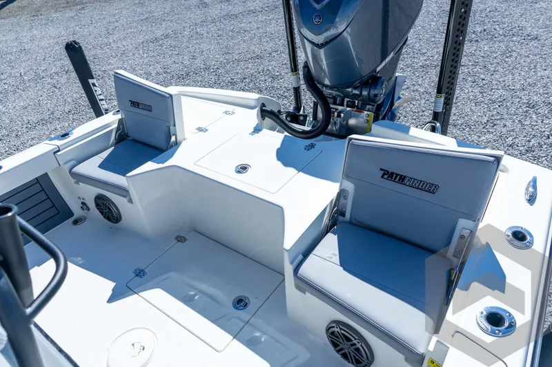 Slide: The Image of 2026 Pathfinder 2500 Hybrid boat interior with seating and motor, showcasing modern design. - 87