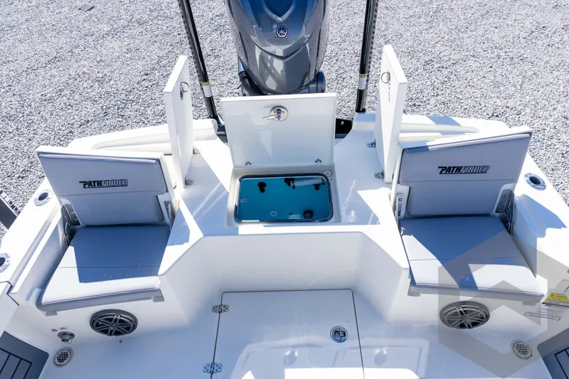 Slide: The Image of 2026 Pathfinder 2500 Hybrid boat interior with seating and storage compartments. - 88