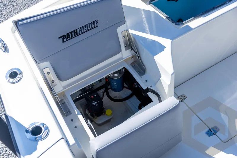 Slide: The Image of 2026 Pathfinder 2500 Hybrid boat interior with open storage compartment. - 89