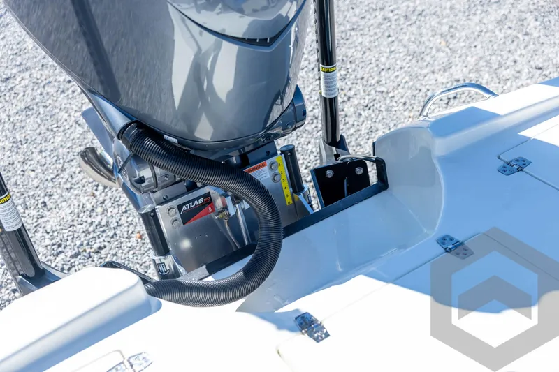 Slide: The Image of 2026 Pathfinder 2500 Hybrid boat engine detail with hydraulic components on a sunny day. - 94