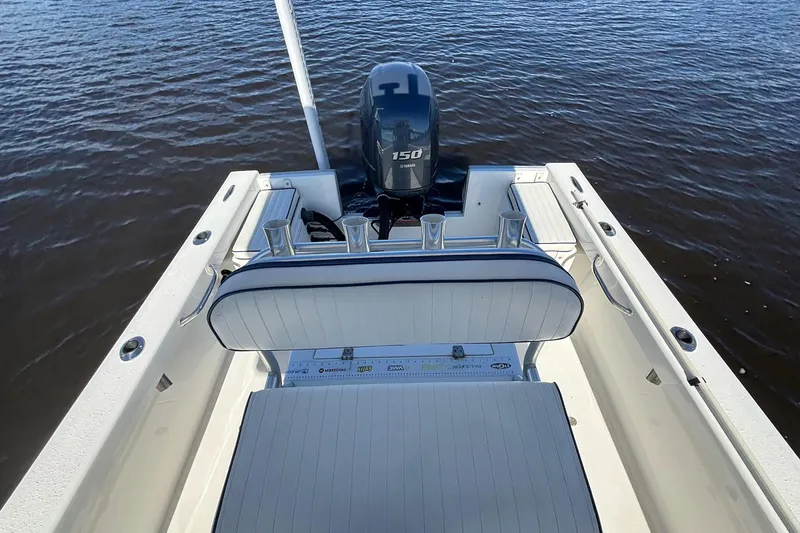 Slide: The Image of KenCraft BreakWater 20 boat, 2015 model, with outboard motor on calm water. - 17