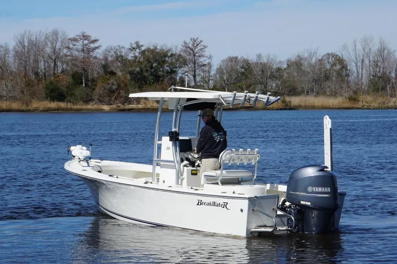 Slide: The Image of 2015 KenCraft BreakWater 20 boat on calm water with Yamaha outboard motor. - 7