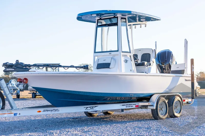 The Image of 2026 Tidewater 2110 Bay Max boat on trailer, featuring sleek design and modern equipment. - 1