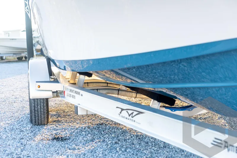 Slide: The Image of 2026 Tidewater 2110 Bay Max boat on trailer, close-up view. - 10