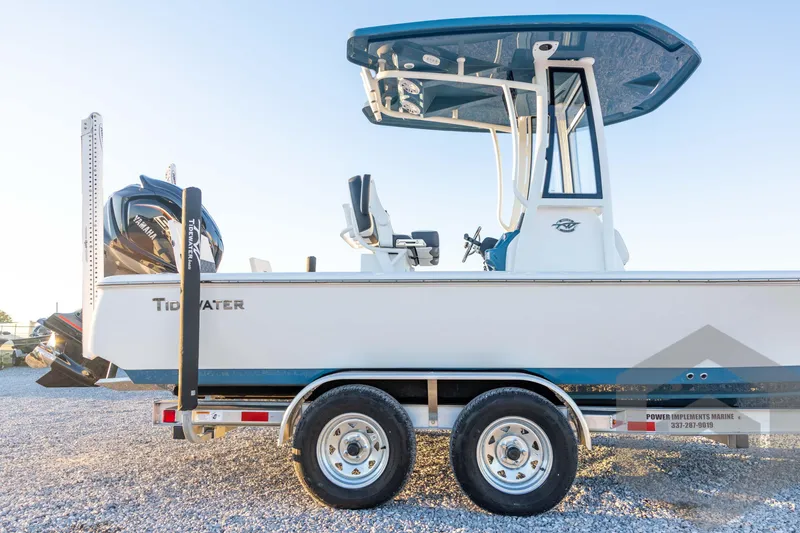 Slide: The Image of 2026 Tidewater 2110 Bay Max boat on trailer, side view, with Yamaha engine. - 13