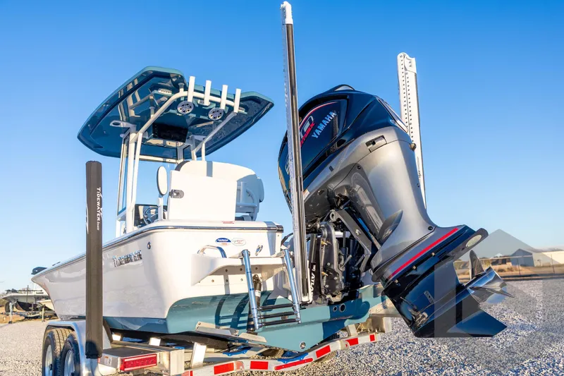 Slide: The Image of 2026 Tidewater 2110 Bay Max boat with Yamaha outboard engine on trailer. - 17