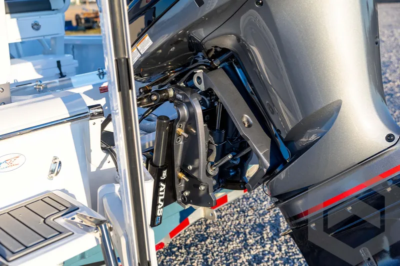 Slide: The Image of 2026 Tidewater 2110 Bay Max boat engine detail with hydraulic components. - 21