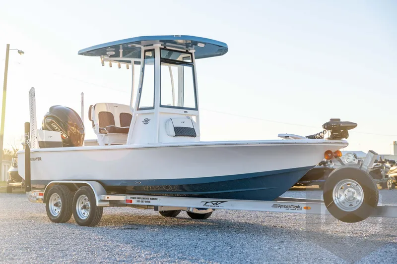 Slide: The Image of 2026 Tidewater 2110 Bay Max boat on trailer, side view in sunlight. - 3