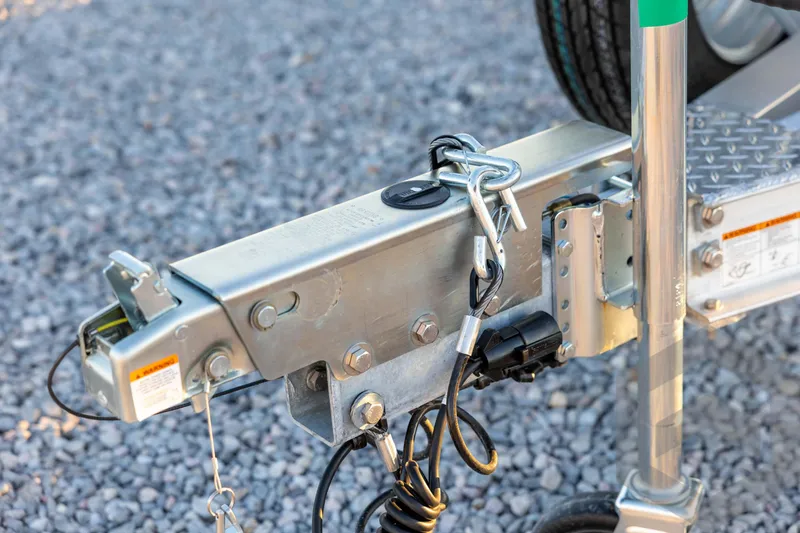 Slide: The Image of Trailer hitch of 2026 Tidewater 2110 Bay Max on gravel surface. - 32