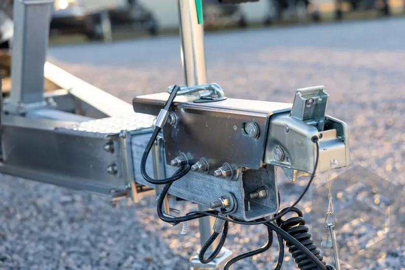 Slide: The Image of Trailer hitch of 2026 Tidewater 2110 Bay Max on gravel surface. - 33