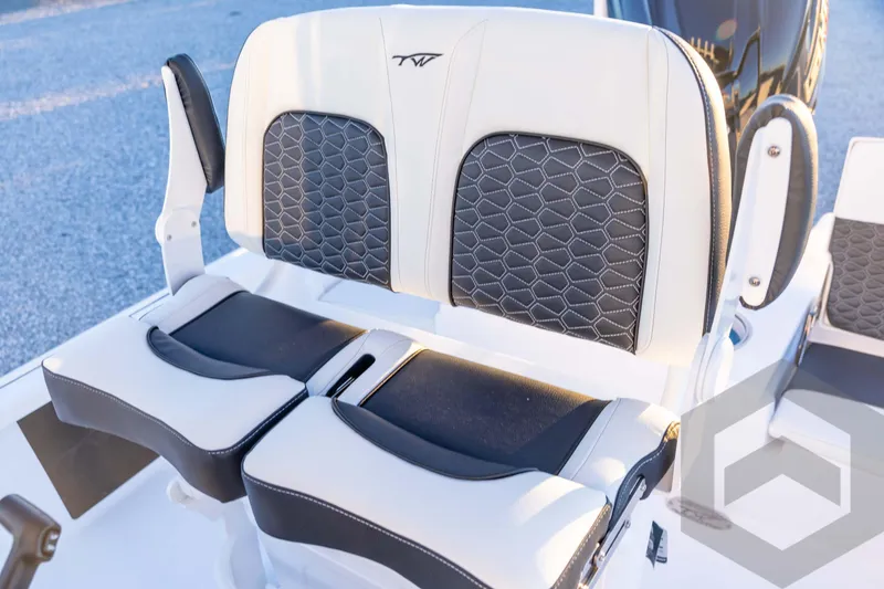 Slide: The Image of 2026 Tidewater 2110 Bay Max boat seats with stylish black and white upholstery. - 61