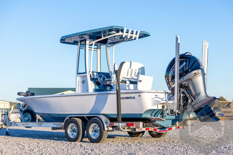 Slide: The Image of 2026 Tidewater 2110 Bay Max boat on trailer, featuring Yamaha outboard motor. - 7