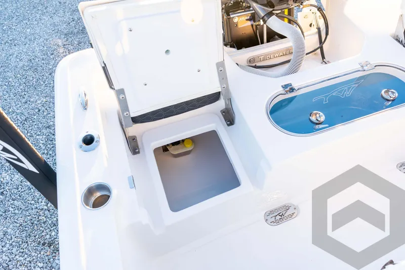 Slide: The Image of 2026 Tidewater 2110 Bay Max boat interior with storage compartments and equipment. - 70