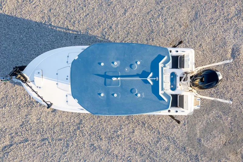 Slide: The Image of Overhead view of 2026 Tidewater 2110 Bay Max boat on gravel surface. - 75