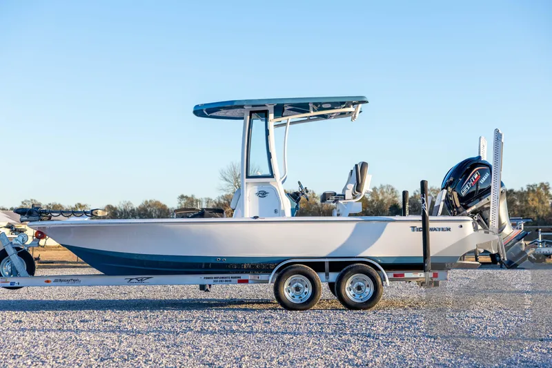 Slide: The Image of 2026 Tidewater 2110 Bay Max boat on trailer, side view, outdoors. - 8
