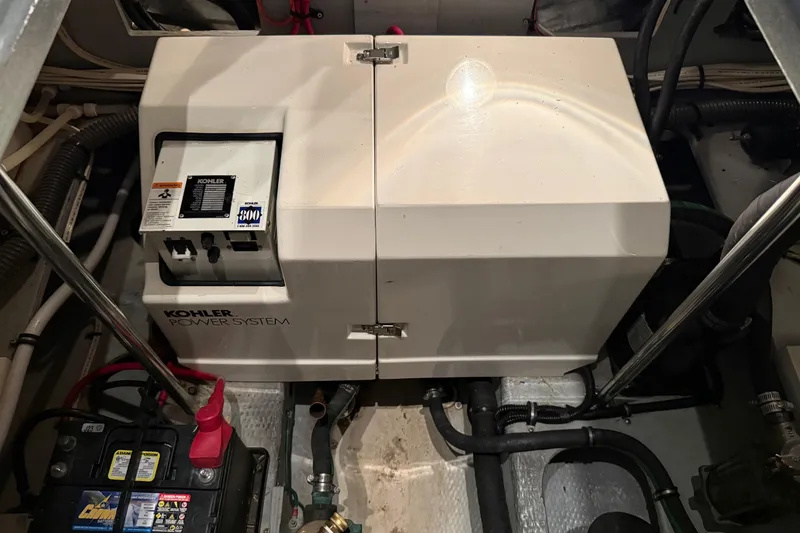 Slide: The Image of Engine room of 1998 Silverton 352 Motor Yacht with Kohler power system. - 51