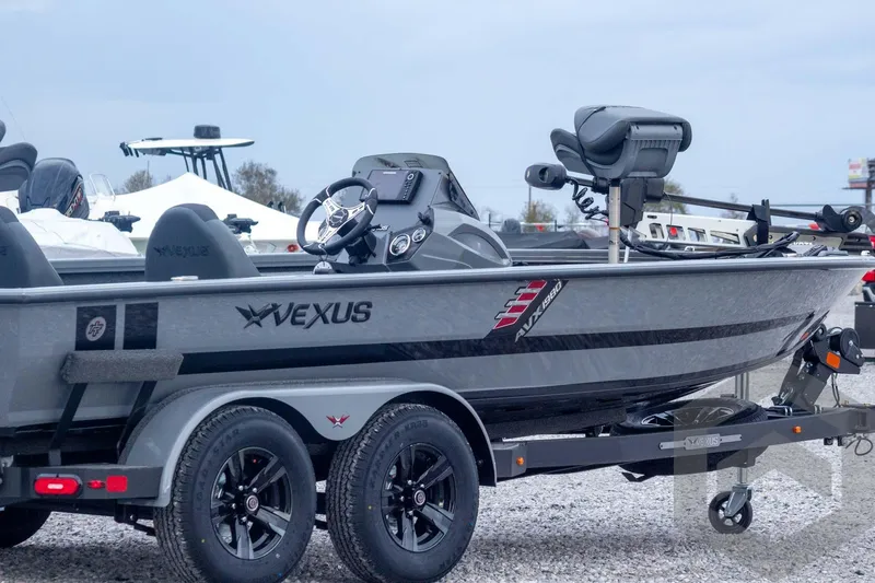Slide: The Image of 2026 Vexus AVX 1980 boat on trailer, featuring sleek design and modern equipment. - 10