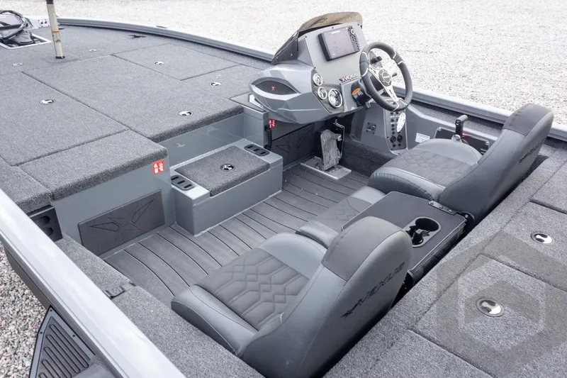 Slide: The Image of 2026 Vexus AVX 1980 boat interior with dual seats, steering console, and carpeted deck. - 29