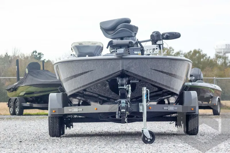 Slide: The Image of 2026 Vexus AVX 1980 boat on trailer, front view, parked outdoors. - 3