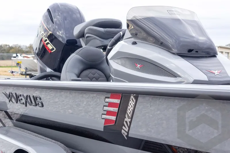 Slide: The Image of 2026 Vexus AVX 1980 boat, sleek design, powerful engine, modern seating, and windshield. - 39